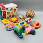 Boite accessoires bebe cartoon rattle