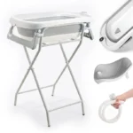 Table à langer bébé avec baignoire intégrée, pratique et sécurisée pour le bain et le change.