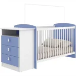 Berceau évolutif blanc avec commode intégrée, mobilier bébé fonctionnel et moderne.